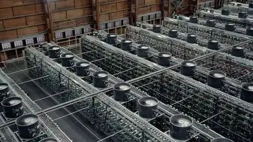 Rows of mining rigs in a large mining farm facility