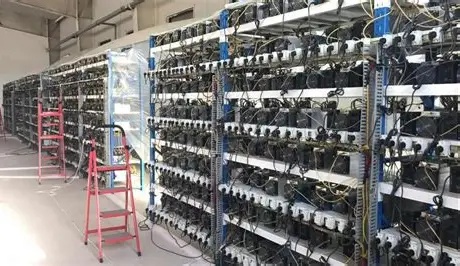 A bustling mining farm filled with machines working tirelessly to mine cryptocurrencies